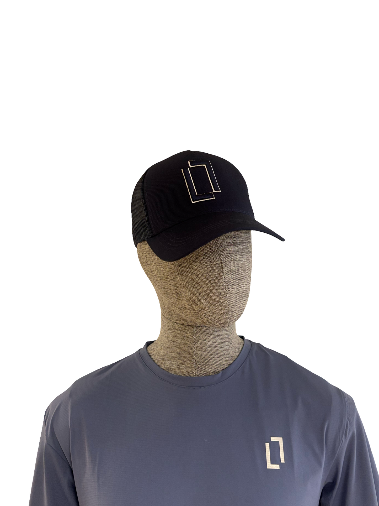 Mannequin wearing a navy cap and gray t-shirt with a logo on a white background